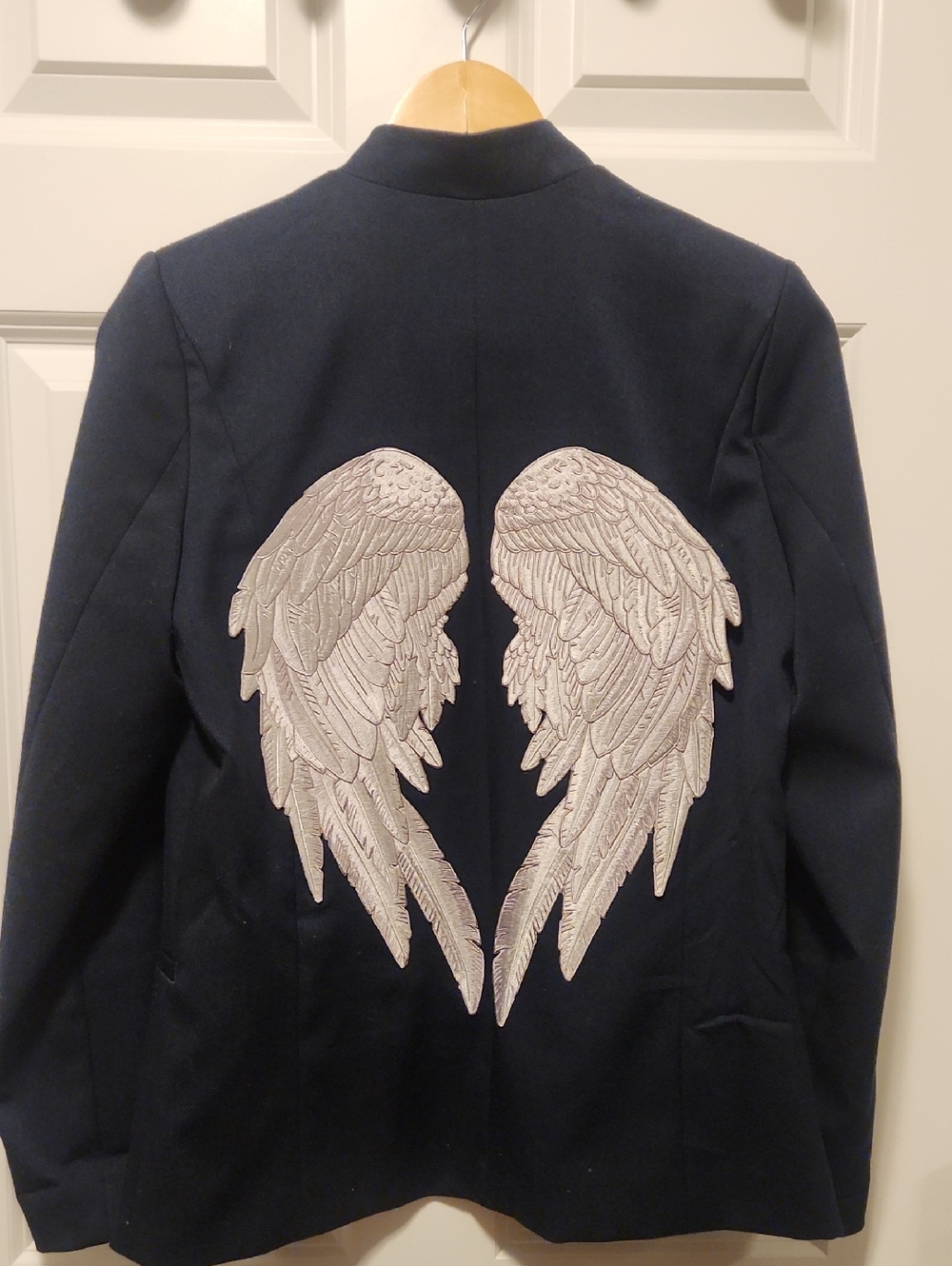 Aqua Navy Open-Front Blazer with wings details on the back.